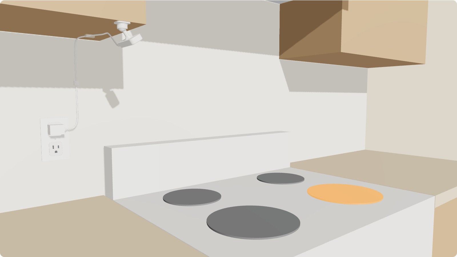 A kitchen with the StoveDetector unit on its ball joint under the cabinet beside the range, aimed toward the stove, with a cord to the nearby outlet.